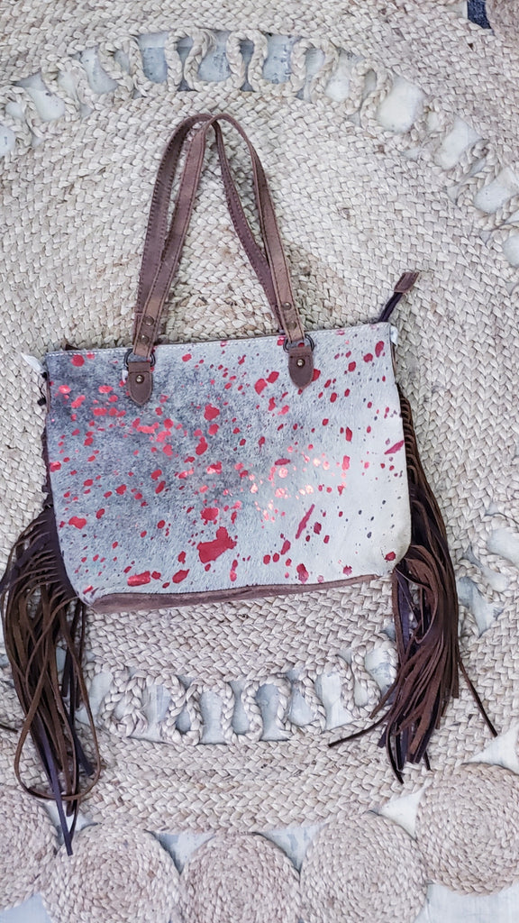 COWHIDE WITH RED CONCEAL