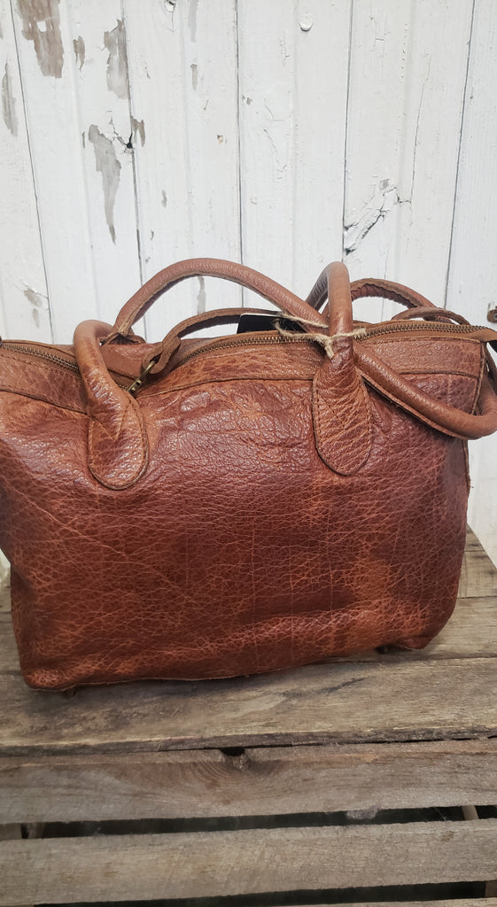 DISTRESSED BROWN LEATHER